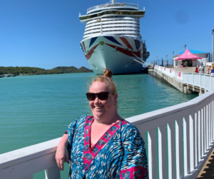 Shared Lives is a bit like fostering an adult but they live their most independent life - like going on a cruise! Helena is pictured wearing some lovely summer clothes, sunglasses and smiling brightly in front of the cruise ship